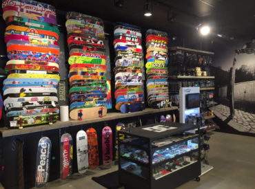 wall of skateboards inside DC store